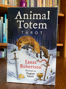Photo of Box front. The Animal Totem Tarot takes the best of the tarot and merges it with the best of the animal totem world (some people call them spirit animals or power animals). "This guide takes you by the hand and walks you through totemic experiences that answer your most pressing questions. Set includes 78 cards, a guidebook and box for storing them. Cost is $28.99.