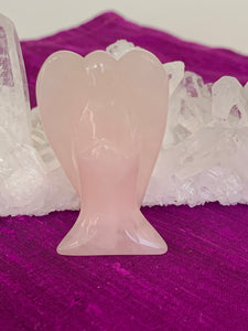 Another close-up view. Lovely rose quartz angel is perfect for your altar, meditation space, to hold while meditating, or anywhere you want to radiate the energy of love ♥. A great gift too! Rose quartz is the "stone of unconditional love & infinite peace." It opens the heart and soothes emotional distress. Size is approximately 2" tall. Angels remind us that we are always being watched over with love.