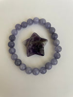 Load image into Gallery viewer, Love this little chevron amethyst star! It can be used for meditation, healing, for your altar or as décor for any room in your home or office. Easy to slip right into your pocket so you have the energy of amethyst everywhere you go. Approximately 1¼&quot;. Cost is $6.

