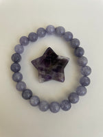 Load image into Gallery viewer, Other side of amethyst crystal. Love this little chevron amethyst star! It can be used for meditation, healing, for your altar or as décor for any room in your home or office. Easy to slip right into your pocket so you have the energy of amethyst everywhere you go. Approximately 1¼&quot;. Cost is $6.
