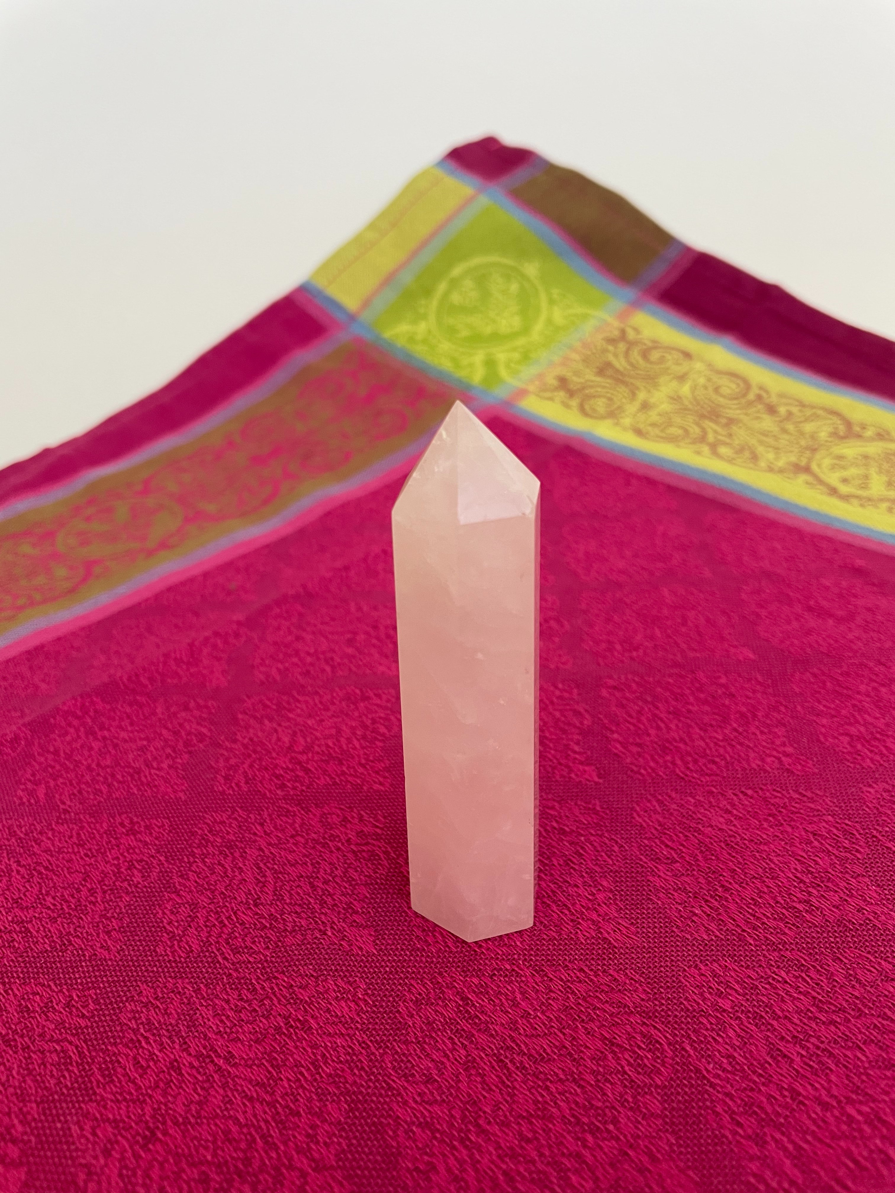 Alternate view. Rose Quartz tower of love 💗. Beautiful rose quartz tower for your altar, for healing or as décor for any room in your home or office. Rose quartz is the ultimate love stone, for love of all types - to attract love and for self-love. It is soothing, enhances compassion, is the best emotional healer, dispels negative energy, opens your heart and so much more. Place this rose quartz tower in your space to radiate a loving vibe all day long. The tower is approximately 3½" long. Cost is $14.