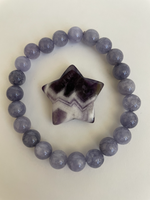 Load image into Gallery viewer, Love the banding on this particular chevron amethyst star. It can be used for meditation, healing, for your altar or as décor for any room in your home or office. Easy to slip right into your pocket so you have the energy of amethyst everywhere you go. Approximately 1¼&quot;. Cost is $6.
