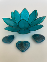 Load image into Gallery viewer, Another view with several hearts. Love this blue apatite heart! Great to carry in your pocket, place on your altar or bookshelf or to hold during meditation. Apatite enhances manifestation, aids psychic abilities and meditation, helps you to express yourself verbally, aids in reaching high levels of spiritual guidance, boosts creativity and helps to ease anger and irritation (along with other wonderful qualities). The apatite heart is approximately 1¼&quot; at it&#39;s widest expanse. Cost is $6.

