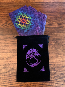 Lovely Oracle deck/tarot bag with drawstrings for closure. Purple embroidered Tree of Life is in the middle of the black, faux-velvet bag with four other Celtic designs above and below to the left and right of the Tree. The 7"x5" bag fits most any size oracle deck but is best suited for larger cards (eg. Medicine Cards). Can also be used to store large crystals or other precious items. Cost is $7.50