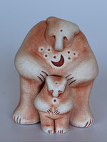 Load image into Gallery viewer, Close-up view. Lovely sacred art sculpture of wild bear mother and her cub. We all know the reputation a mama bear has when it comes to protecting her young - fierce indeed! Protective and nurturing, instinctive and intuitive, she carries powerful medicine. More information about bear comes from the Medicine Cards: bear&#39;s strength lies in its ability to go within, quiet the mind and find the truth (as in hibernating, resting, solitude and silence). Approximately 2.25&quot; tall.
