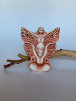 Load image into Gallery viewer, This lovely sacred art sculpture is entitled &quot;Butterfly,&quot;  a clay sculpture in browns &amp; tans depicting a woman rejoicing, her butterfly wings extended. In the lower part of her body is a woman&#39;s face, arms and chest area bursting upward (she has antennae). Beautiful and intricate! Butterfly is all about transformation  Emerging can be be unsettling, but also bring joy, life and the freedom of flight. The Sculpture is approximately 3.5&quot; tall. 
