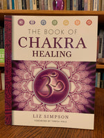 Load image into Gallery viewer, Front cover. The Book of Chakra Healing by Liz Simpson is a &quot;comprehensive guide to the ancient Indian System of chakras.&quot; Simpson discusses each of the chakras and how to unblock them and move into a more balanced energy. Liz Simpson is a journalist and author who focuses on alternative healing and personal development. She writes for many national and international magazines as well. Cost is $14.95.
