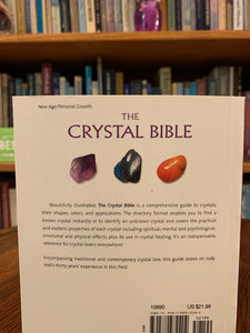 Close-up view of back cover. The Crystal Bible is a comprehensive book about crystals and gemstones by Judy Hall, an expert in the field. It is 400 pages long and is made with high quality paper. Most of the book is devoted to in depth descriptions of the esoteric and practical properties of stones and crystals, but she also includes sections on crystal care, crystal healing, crystal formation, etc. She has 3 separate volumes of her crystal Bible books and also a book on crystal healing.