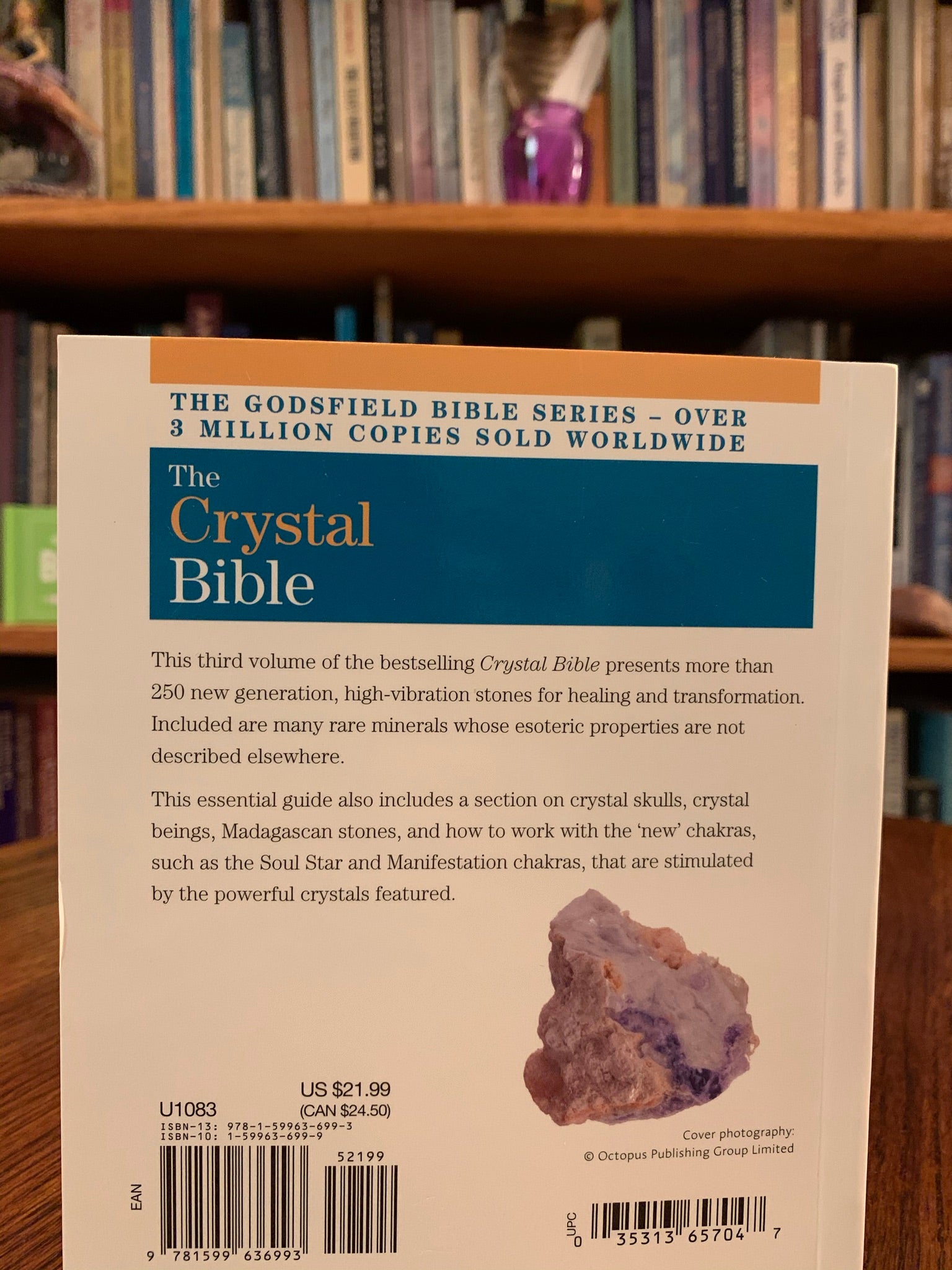 Close-up view back cover. The Crystal Bible 3 is the third comprehensive book about crystals and gemstones by Judy Hall, including 250 additional crystals. It is 400 pages long and made with high quality paper. Most of the book is devoted to in depth descriptions of the esoteric and practical properties of stones and crystals, but she also includes sections on crystal vibrations, crystal skulls and more. She has written three separate volumes of her crystal Bible books and also a book on crystal healing.