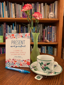 Present Not Perfect is a guided journal to help you to let go of trying to be perfect, to release your inner critic and to be present in the moment and accepting and loving of the imperfect person you are - we all are. This journal offers 120 pages of ways to bring more mindfulness - present moments, inspiration, self-understanding and compassion to yourself.  It includes colorful illustrations as well as inspiring and self-exploratory words and prompts. Cost is $14.99.