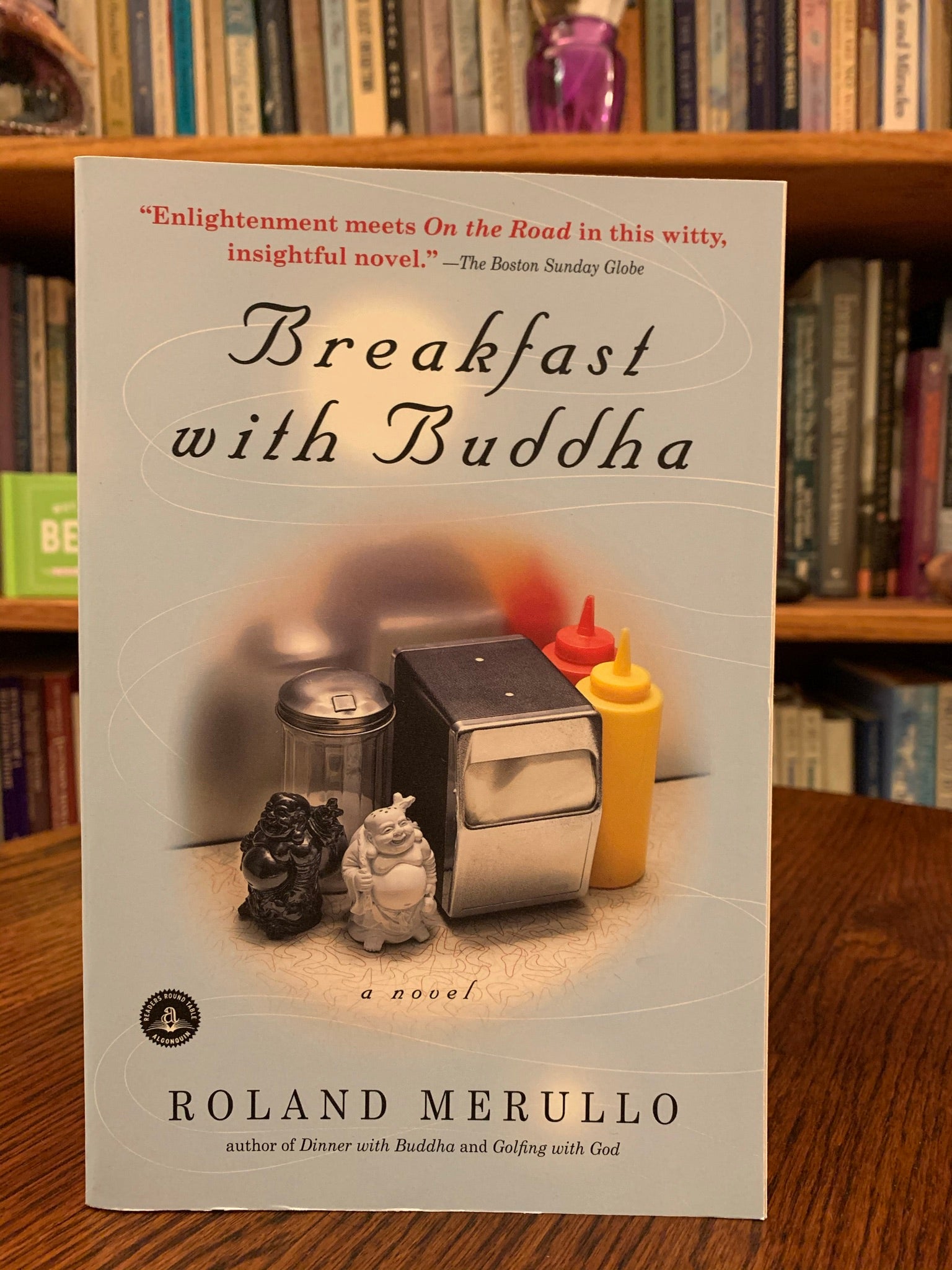 Front Cover of Breakfast With Buddha. Let me just tell you that this book and the other two in this series are some of the most enjoyable I have read. I have even re-read them and I rarely do that. This book is fiction, but laced with wonderful spiritual insights and laugh-out-loud moments! It is fun to read and deeply touching to the heart, soul and spirit. The protagonist gets stuck taking a cross-country drive with a spiritual guru and there the fun begins. Cost is $15.95.