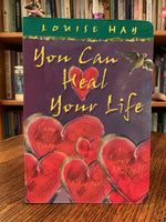 Load image into Gallery viewer, Close-up front cover. You Can Heal Your Life (gift edition with beautiful illustrations) by the amazing Louise Hay. This is one of the first books I ever read as I transformed my own life spiritually and re-oriented my belief about healing to a holistic and natural approach. It is a wonderful book with profound information about healing, self-healing and self-love, in which Hay tells her own story of transformation and healing and of how she beat cancer in natural ways. Cost is $24.99.
