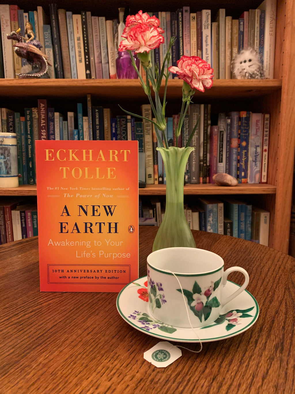 "A New Earth" by Eckhart Tolle. In this book Tolle expands on ideas from his first book The Power of Now - "powerful ideas to show how transcending our ego-based state of consciousness is not only essential to personal happiness, but also the key to ending conflict and suffering throughout the world. Tolle describes how our attachment to the ego creates the dysfunction. His message is simple - stay conscious - in the present moment and don't allow the mind to lead you away from it. Cost is $17.00