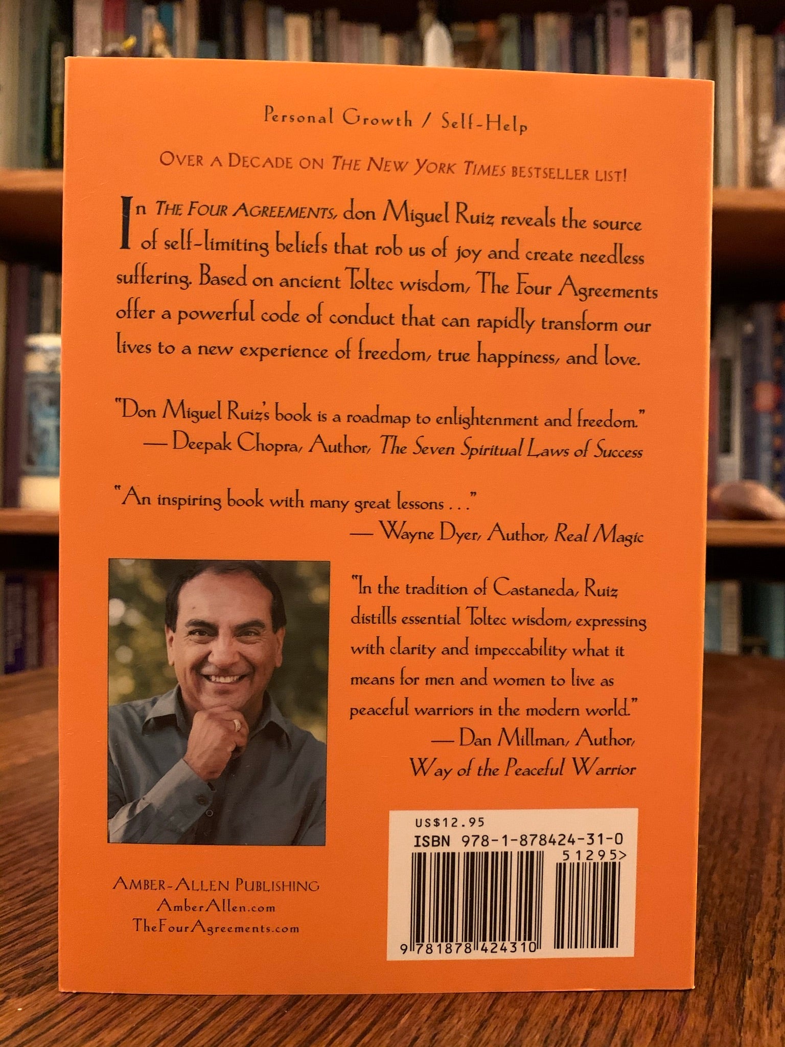 Close-up back cover. Based on ancient Toltec Wisdom, The Four Agreements by don Miguel Ruiz, guides us to a personal and spiritual transformation using four simple words and their power, meaning and call to "action." "In the tradition of Casteneda, Ruiz distills essential Toltec wisdom, expressing with clarity and impeccability, what it means for men and women to live as peaceful warriors in the modern world (Dan Milllman, author of Way of the Peaceful Warrior). Cost is $12.95