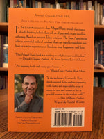 Load image into Gallery viewer, Close-up back cover. Based on ancient Toltec Wisdom, The Four Agreements by don Miguel Ruiz, guides us to a personal and spiritual transformation using four simple words and their power, meaning and call to &quot;action.&quot; &quot;In the tradition of Casteneda, Ruiz distills essential Toltec wisdom, expressing with clarity and impeccability, what it means for men and women to live as peaceful warriors in the modern world (Dan Milllman, author of Way of the Peaceful Warrior). Cost is $12.95
