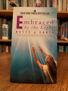 Close-up of front cover. Embraced by the Light is the true story of Betty J. Eadie's amazing, profound, and life-changing near death experience. It is detailed and mind-blowing and as you walk through her story with her you will be inspired by her experience! She came away with the idea that she often shares - "That death need not be feared" and that the spirit world is one of exquisite beauty. Cost is $7.99