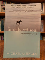 Load image into Gallery viewer, Close-up of front cover. The Untethered Soul by Michael Singer is a guide to helping you to let go of your limitations and feel the boundlessness of true freedom - from the mind, the old unhealthy patterns and emotions. &quot;East is East and West is West, but Michael Singer bridges these two great traditions in a radiant treatise on how to succeed in life from our spiritual quest to our everyday tribulations&quot; (Ray Kurzweil). Cost is $18.95
