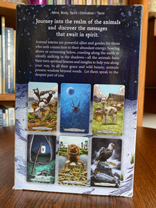 Photo of back of box with a sampling of the cards. The Animal Totem Tarot takes the best of the tarot and merges it with the best of the animal totem world (some people call them spirit animals or power animals). "This guide takes you by the hand and walks you through totemic experiences that answer your most pressing questions." Set includes 78 cards, a guidebook and box for storing them. Cost is $28.99.