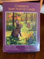 Load image into Gallery viewer, Photo of box front. Children&#39;s Spirit Animal Cards, with their colorful and inspiring illustrations give children the chance to choose cards and gain insights without the complexities of adult oracle cards. It also opens children up to the idea of spirit animals and the powerful messages they bring with simple words or phrases and artwork that they will love. Set consists of 24 oracle cards, guidebook (with guidance for parents) and a box for storage. Cost is $15.99
