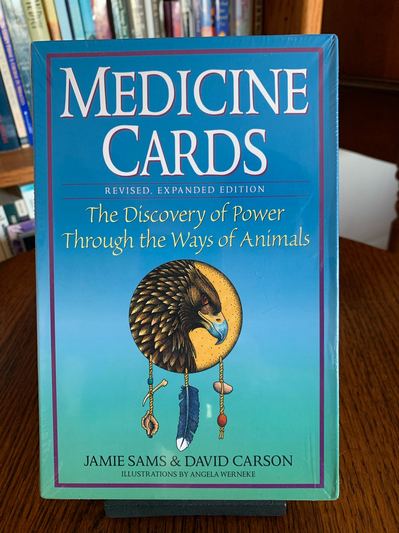 Close-up View/front. Medicine Cards by Jamie Sams and David Carson (with beautiful artwork by Angela Werneke) is THE foundational animal oracle deck. It includes 52 cards (and several blank cards) plus a companion book with descriptions and drawings. The cards are beautifully illustrated. These cards can be used to do readings, to research animal energies you are drawn to or have encounters with and for help with understanding any issue you may want to resolve. Price is $29.95.