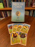 Load image into Gallery viewer, Medicine Cards by Jamie Sams  and David Carson (with beautiful artwork by Angela Werneke) is THE foundational animal oracle deck. It includes 52 cards (and several blank cards) plus a companion book with descriptions and drawings. The cards are beautifully illustrated.  These cards can be used to do readings, to research animal energies you are drawn to or have encounters with and for help with understanding any issue you may want to resolve. Price is $29.95
