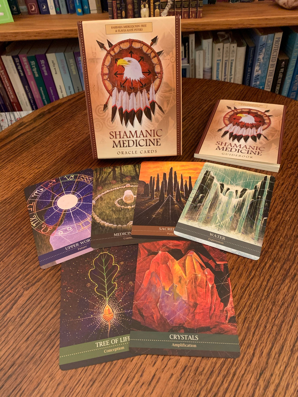 Shamanic Medicine Oracle Cards consist of 50 oracle cards, a guidebook, and a box for storing them. Gorgeous illustrations (by Yuri Leitch) accompany the beautiful insights and writings of the authors: Barbara Meiklejohn-Free & Flavia Kate Peters. Use these cards for "wise counsel, divination and a fuller understanding of the medicine of each card." This is a very powerful deck.  Price is $23.95.