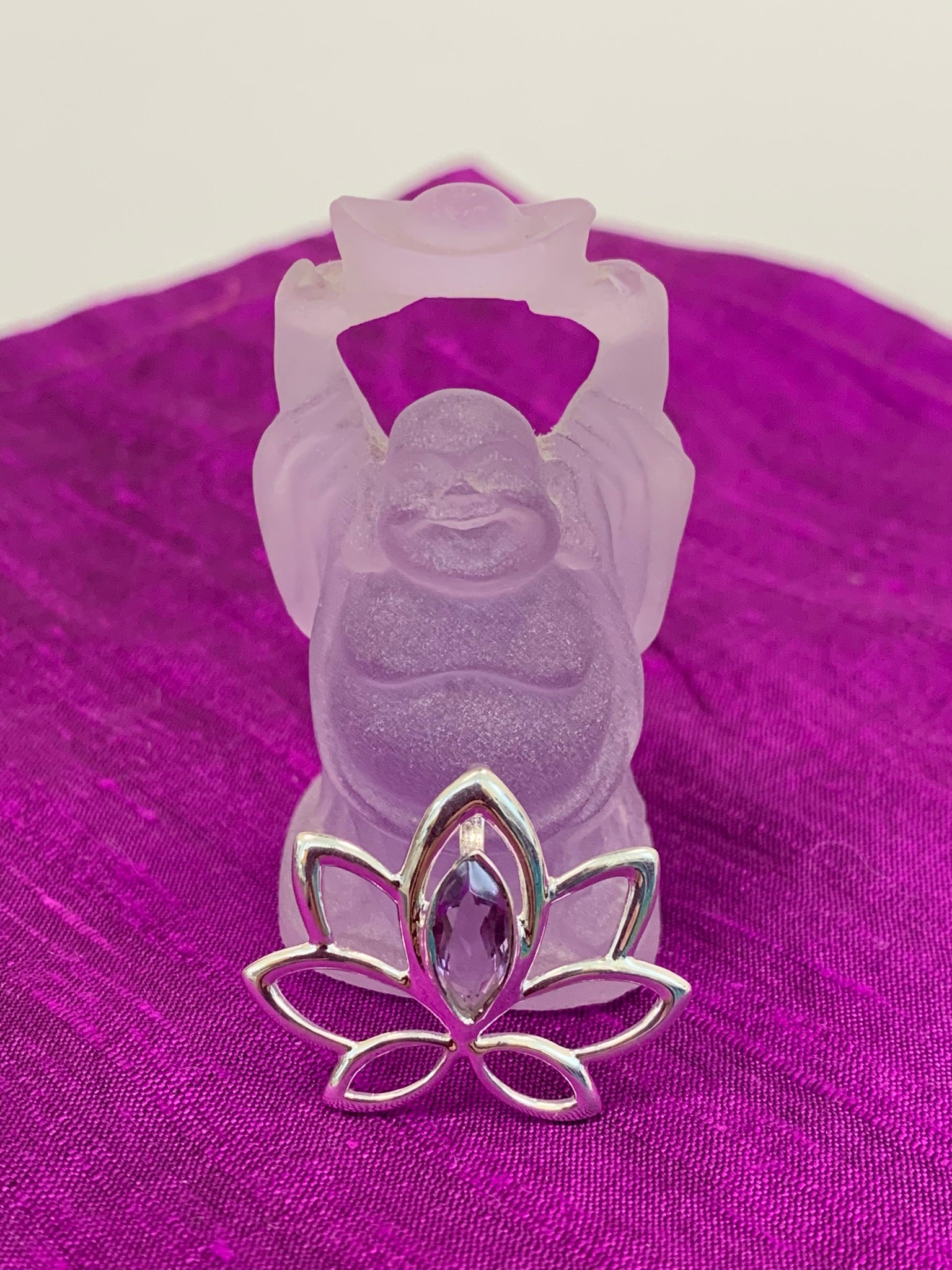 Close-up View. Marquise shaped amethyst set at the top of an open sterling silver lotus. Pendant only, no necklace chain. This lovely pendant is lightweight and approximately 1" long.
