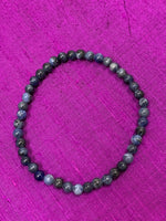 Load image into Gallery viewer, Close-up View. Sodalite gemstone power bracelet with 4mm beads. Tiny and mighty, this bracelet puts the power of sodalite right around your wrist. Buy one or have fun wearing and sharing them - there is a variety of gemstone choices for these bracelets.

