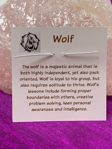 This is a photo of the information about wolf and its lessons that is printed on the back of the pendant card and is included with your purchase of the spirit animal wolf pendant.