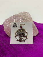 Load image into Gallery viewer, Sterling silver spirit animal, sea turtle, pendant, accented with an opal gemstone. Sea turtle is inside of a stylized, sterling silver, open circle with the opal above it. Wear your spirit animal so you can take its energy everywhere you go! Pendant only, necklace chain not included.
