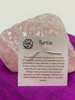 Load image into Gallery viewer, Information about sea turtle and its lessons, printed on the back of the pendant card, is included with the purchase of the pendant. 
