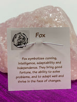 Load image into Gallery viewer, Information about fox and its lessons is printed on the back of the pendant card and included with your purchase of the pendant.
