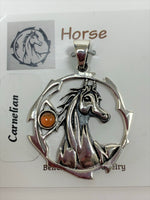 Load image into Gallery viewer, Close-up view. Sterling silver horse spirit animal pendant, accented with a carnelian gemstone. Horse is set within an open, stylized circle with the gemstone on the side (horse and circle are sterling). Wear your spirit animal so you have its energy everywhere you go! Pendant only - necklace chain not included.
