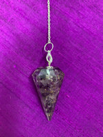 Load image into Gallery viewer, Close-up view. Orgonite pendulum with amethyst, on a thin silver (not sterling) chain, accented by chakra gemstone beads, 1 for each of the 7 major chakras and an amethyst heart at the very end of the chain.
