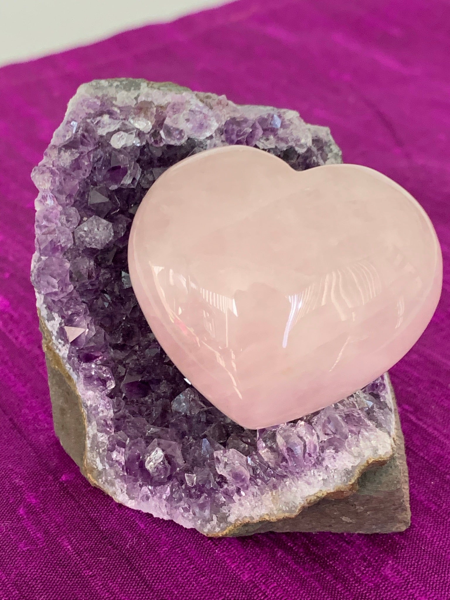 Second close Up View. High quality Rose Quartz heart is perfect for your altar, meditation space or to hold while meditating, or anywhere you want to radiate the energy of love ♥. A great gift too! Rose quartz is the "stone of unconditional love & infinite peace." It opens the heart and soothes emotional distress. Size is approximately 40mm.