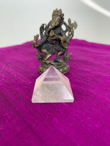 Powerful clear quartz pyramid is perfect for your altar, meditation space or anywhere in your home or office. This pyramid is cloudy or milky in appearance - more translucent than the other clear quartz pyramids. So, the clear vs the cloudy - it's all in the eye of the beholder ;). Quartz is the "most powerful healing and energy amplifier on the planet" (Judy Hall). It increases your spiritual energy to the highest level.  Pyramids are used to amplify and transform energy.  Approximately 1"x1"