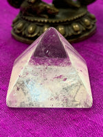 Load image into Gallery viewer, Close-up view. Powerful clear quartz pyramid is perfect for your altar, meditation space or anywhere in your home or office. Quartz is the &quot;most powerful healing and energy amplifier on the planet&quot; (Judy Hall). It is cleansing to organs of the physical body and It also cleanses the soul and it increases your spiritual energy to the highest level. Pyramids are used to amplify and transform energy.  Approximately 1&quot;x1.&quot; 
