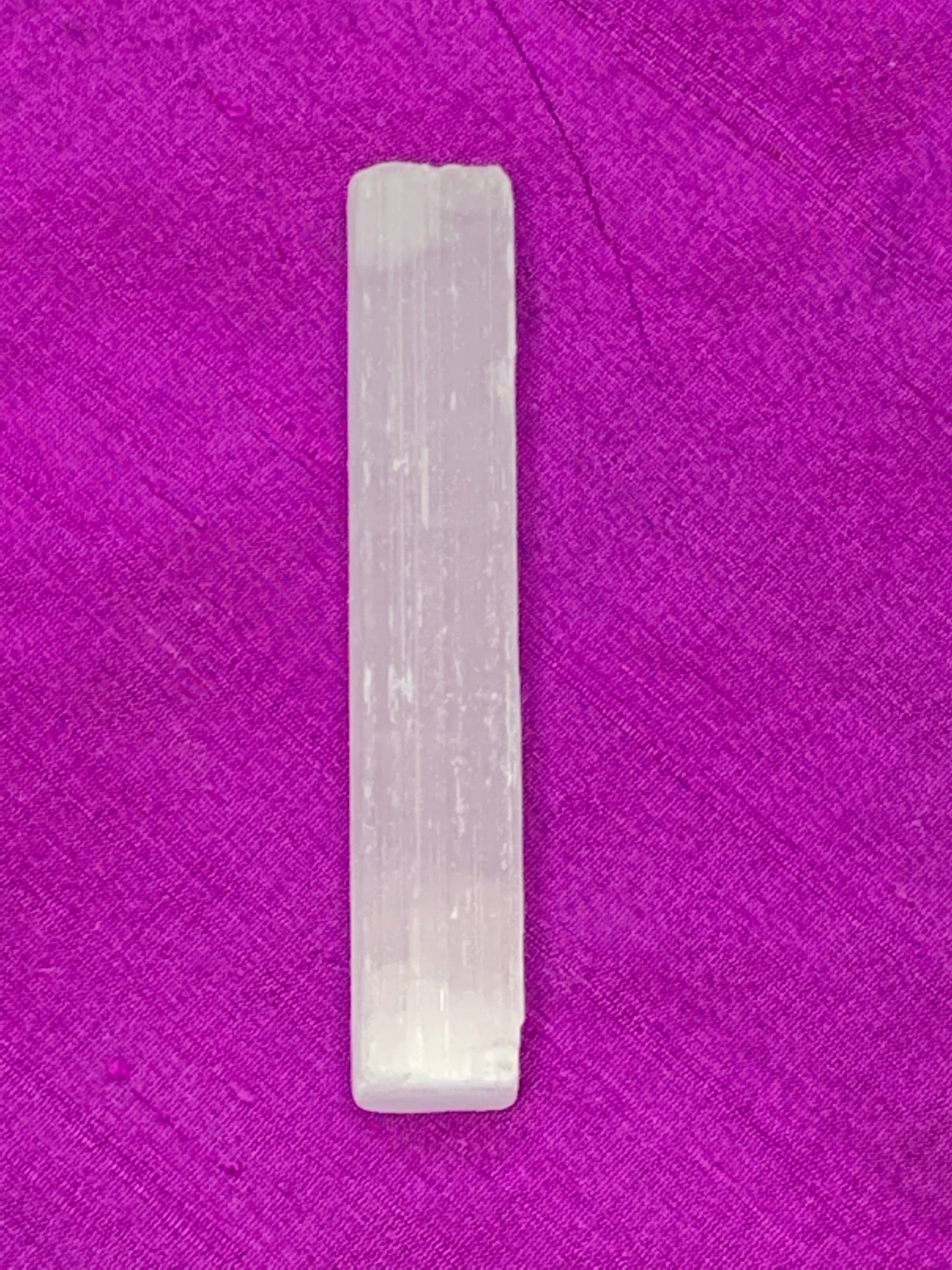 Close-up view of one of the selenite wands (that comes in the pack of 5).