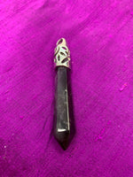 Load image into Gallery viewer, Long amethyst crystal point is set in a fancy silver bail (not sterling silver) for this powerful pendant. Amethyst, one of the most spiritual gemstones, heals, cleanses &amp; calms, allowing you to reach meditative &amp; higher consciousness levels more easily. It also helps to dispel negative emotional states. Perfect for wearing to take advantage of its benefits all day long. Approximately 2½&quot;.
