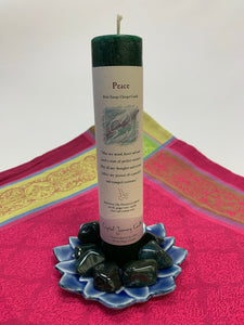 Reiki-charged pillar candle infused with the energy of "peace."  It is handcrafted and scented using essential oils. An affirmation/prayer is printed on the label, as well as a listing of the essential oils used (myrrh, ginger root, vanilla, clove, caraway seed). It is approximately 7"x2½". Perfect for meditation, prayer, visualization or quiet time. This deep green candle and its label are both visually appealing.