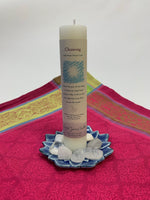 Load image into Gallery viewer, Reiki-charged pillar candle for &quot;Cleansing.&quot; It is handcrafted and scented using essential oils. An affirmation/prayer is printed on the label, as well as a listing of the essential oils used (white sage, white thyme, white birch, hyssop). It is approximately 7&quot;x2½&quot;. Perfect for meditation, prayer, visualization or quiet time. This white candle and its label are both visually appealing.
