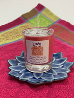 Load image into Gallery viewer, Handcrafted pink votive candle in a glass holder. The wax is soy-based (no paraffin) and is also vegan. Wicks are made with paper and cotton only. It comes with an attractive label stating the intention/purpose of the candle, &quot;Love,&quot; and an affirmation for your use: &quot;May love enter my life and fill my heart and soul&quot;

