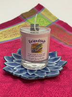 Load image into Gallery viewer, Handcrafted light pink votive candle in a glass holder. The wax is soy-based (no paraffin) and is also vegan. The wick is made with paper and cotton only. It comes with an attractive label stating the intention/purpose o the candle: &quot;Friendship&quot; and an affirmation for your use - &quot;I see magic in every soul and value and respect all.&quot; 
