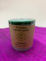 Load image into Gallery viewer, Close up of one of the 7 candles - front of label. Lovely scented set of chakra candles, one representing each of the 7 major chakras. Made with natural essential oils. They are handmade and fair trade (workers receive fair wages for their work). Comes with information/instruction sheet. Use for meditation or chakra awakening/alignment. Each candle is approximately 1.75&quot;. These candles are handmade and fair trade.
