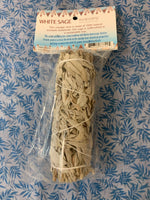 Load image into Gallery viewer, This white sage smudge stick is made of 100% natural botanicals and sustainable methods are used in wildcrafting it. Smudging with sage has its roots in Native American traditions. Use it to: *Cleanse, clear &amp; purify your space or environment - home, office,  *Cleanse, clear or purify a person &amp; their energy *Promote healing *Promote clarity of mind *Clear out spiritual impurities  *Enhance ceremony or ritual  This smudge stick is approximately 6&quot;x1½&quot;.   *This product includes 1 sage stick only. Any other i
