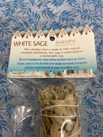 Load image into Gallery viewer, Close-up of Info Tag. This white sage smudge stick is made of 100% natural botanicals and sustainable methods are used in wildcrafting it. Smudging with sage has its roots in Native American traditions. Use it to: *Cleanse, clear &amp; purify your space or environment - home, office, *Cleanse, clear or purify a person &amp; their energy *Promote healing *Promote clarity of mind *Clear out spiritual impurities *Enhance ceremony or ritual. Approximately 9.5&quot;x2&quot;. Cost is $8.50.
