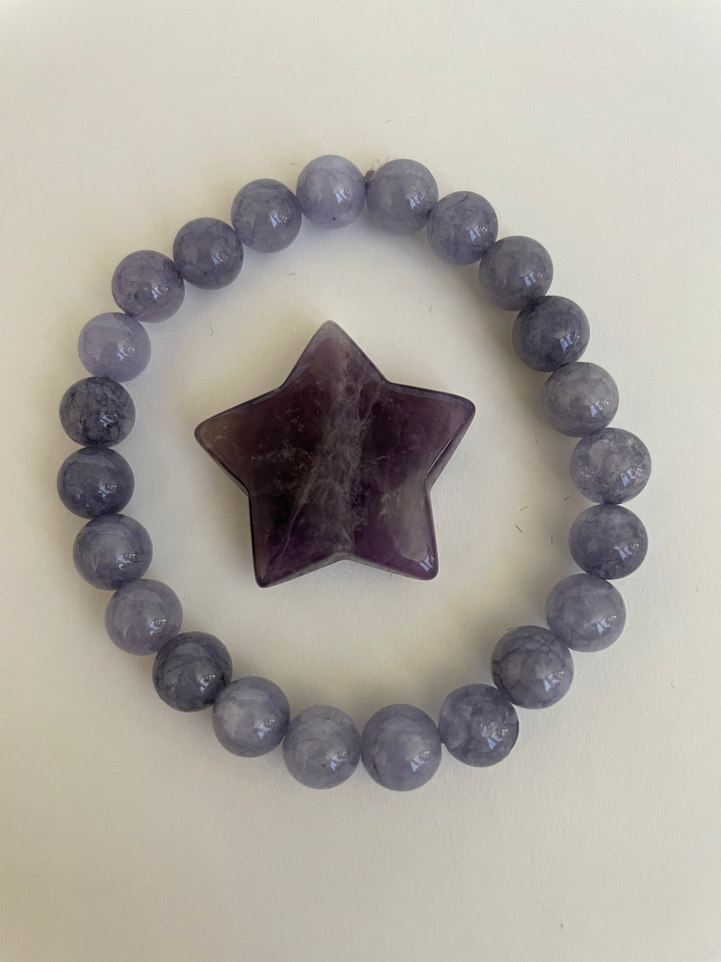 Love this little chevron amethyst star! The white quartz tips one of the points of the star.  It can be used for meditation, healing, for your altar or as décor for any room in your home or office. Easy to slip right into your pocket so you have the energy of amethyst everywhere you go. Approximately 1¼". Cost is $6.