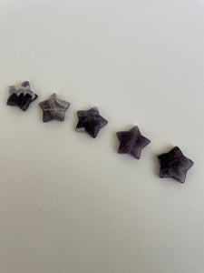 Another view of several amethyst stars. Love the banding on this particular chevron amethyst star. It can be used for meditation, healing, for your altar or as décor for any room in your home or office. Easy to slip right into your pocket so you have the energy of amethyst everywhere you go. Approximately 1¼". Cost is $6 for one star. 