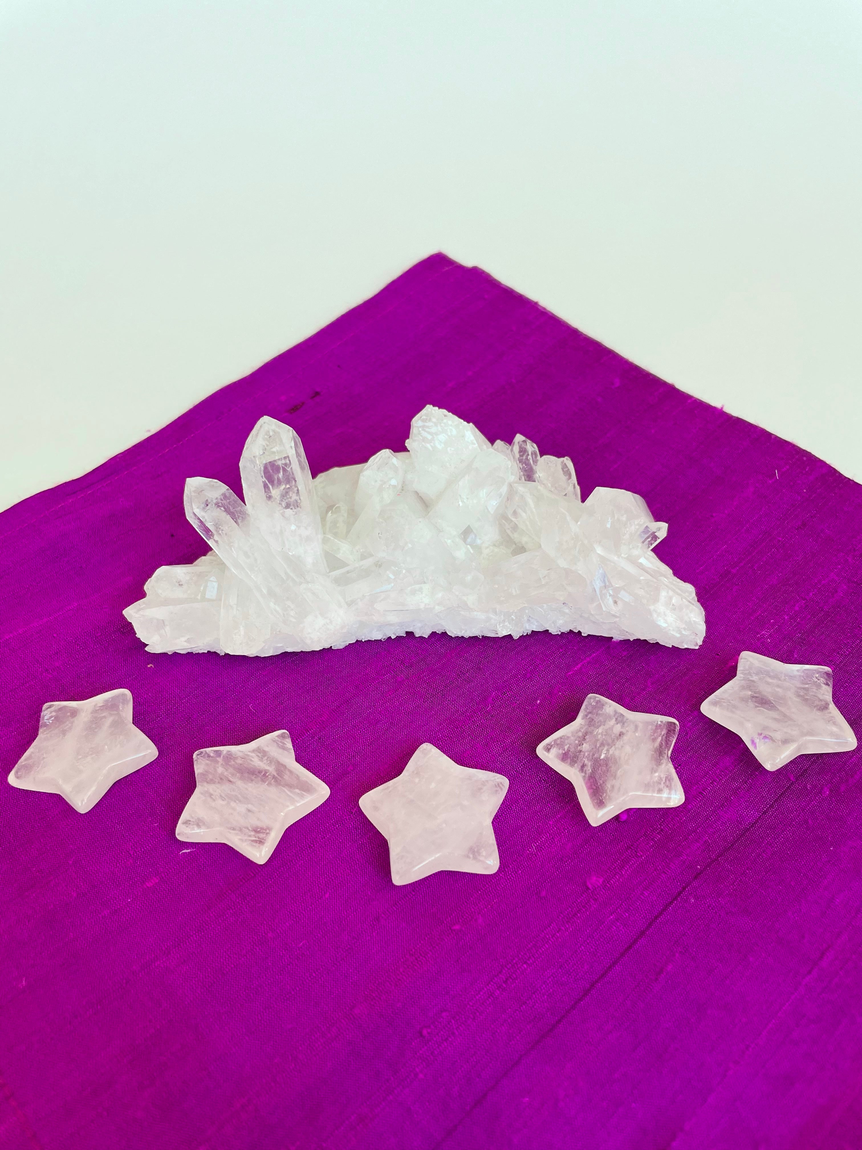 View of several quartz crystal stars. This powerful little quartz crystal star can be used for meditation, healing, for your altar, or as décor for any room in your home or office. Easy to slip right into your pocket so you can take the energy of Quartz everywhere you go. Quartz is the "most powerful healing and energy amplifier on the planet" (Judy Hall). Approximately 1¼". Cost is $6 for one star. 