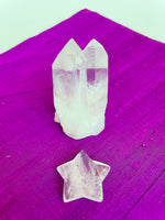 Load image into Gallery viewer, This powerful little quartz crystal star can be used for meditation, healing, for your altar, or as décor for any room in your home or office. Easy to slip right into your pocket so you can take the energy of Quartz everywhere you go.  Quartz is the &quot;most powerful healing and energy amplifier on the planet&quot; (Judy Hall). Approximately 1¼&quot;. Cost is $6.

